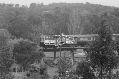Photograph, George Coop, A Harris (Blue) train crossing the Eltham Railway Trestle Bridge at Panther Place, c.1980, 1980