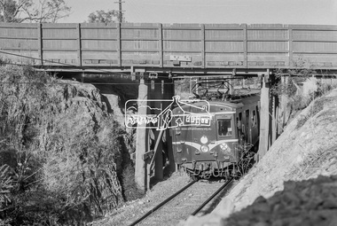 Photograph, George Coop, A Hurstbridge bound Harris (Blue) train passes underneath the Silver Street railway overpass at Eltham, March 1980, 1980
