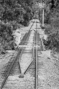 Photograph, George Coop, Derailment guard rails on the Hurstbridge line as the track crosses the Diamond Creek just north of Allendale Road, Diamond Creek, 6 December 1980, 1980