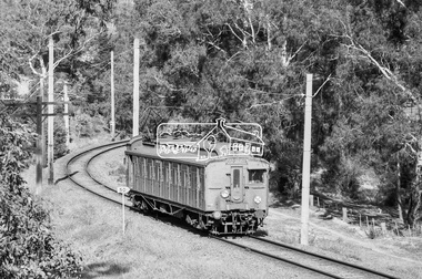 Photograph, George Coop, Single Motor Carriage 473M (Red Rattler) Tait train heading to Hurstbridge just before crossing over the Diamond Creek north of Allendale Road, 17 July 1983, 1983