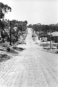 Photograph, Looking east along Pitt Street towards the intersection with Bible Street, Eltham, c. September 1966, 1966c