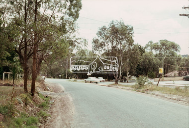 Photograph, Looking west along Old Eltham Road towards intersection with Main Road, Lower Plenty, 1968, 1968