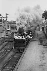 Photograph, Steam locomotive R-704 departing from Bendigo Railway Station, c November 1962