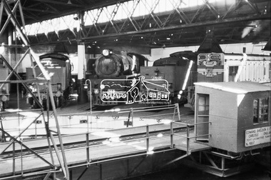 Photograph, Steam locomotives R-769, J-510 and diesel-electric locomotive T-325 in the locomotive shed, Bendigo Railway Station, c November 1962