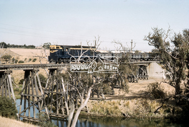 Photograph, D-class Diesel Locomotive D-1 crossing the railway trestle bridge over the Mooroobool River, Fyansford Cement Works Railway, November 1962, 1962