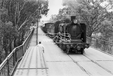 Photograph, Steam locomotive K-168 crossing the Echuca-Moama Road Rail Bridge over the Murray River, c.May 1963, 1963