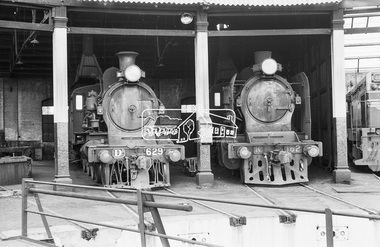 Photograph, Steam locomotives D3-629 and K-162 in the locomotive workshop at Seymour Railway Station, c.May 1963, 1963