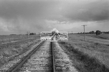 Photograph, Steam locomotive R-706 hauling an upgoods train departing Echuca and heading south, August 1963, 1963