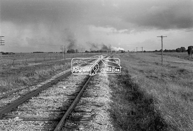 Photograph, Steam locomotive R-706 hauling an upgoods train departing Echuca and heading south, August 1963, 1963
