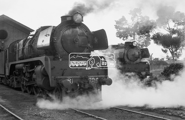 Photograph, R-class steam locomotives R-704 and R-727 outside the locomotive shed, Echuca Railway Station, August 1963, 1963