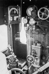 Photograph, Inside the cab of steam locomotive K-158 near the coal hopper, Echuca Railway Station, November 1963, 1963