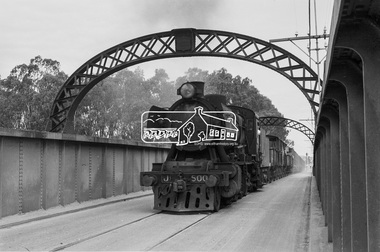 Photograph, Steam locomotive J-500 and goods train crossing the Echuca-Moama Road Rail Bridge, November 1963, 1963