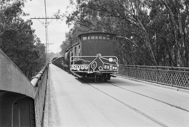 Photograph, Steam locomotive J-500 and goods train crossing the Echuca-Moama Road Rail Bridge, November 1963, 1963