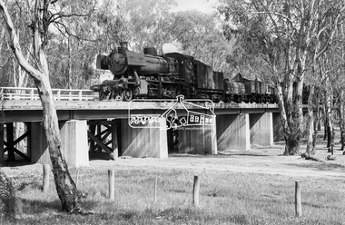 Photograph, Steam locomotive J-526 crossing a flood plain bridge at Moama, November 1963, 1963