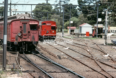 Photograph, Hurstbridge bound Single Motor Carriage (Red Rattler) Tait Sunday service train departs Eltham Station, c. January 1983, 1983