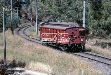 Photograph, Single Motor Carriage 471M (Red Rattler) Tait train heading to Hurstbridge just before crossing over the Diamond Creek north of Allendale Road, January 1983, 1983
