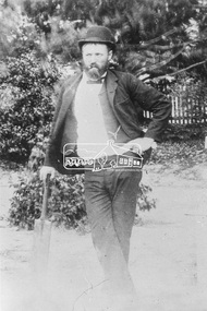 Photograph, Gentleman in bowler hat with cricket bat, possibly Diamond Creek or Hurstbridge district, c.1910