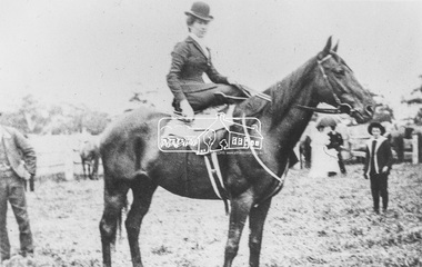 Photograph, Portrait of a woman side saddle on a horse, possibly in the Diamond Creek or Hurstbridge district, c.1910