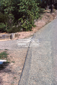 Photograph, Rollover kerb sprayed and Lilydale topped, Riverhill Drive, Lower Plenty, c.March 1981, 1981