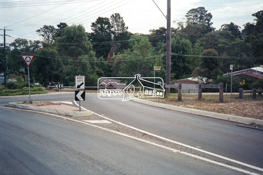 Photograph, Looking northwest across Main Road from intersection withf Raglan Road towards Ingrams Road, Research, c.1989, 1989