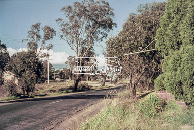 Photograph, Looking east along Main Road, Lower Plenty approaching the top of the hill and Grand Boulevard, July 1969, 1969