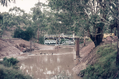 Slide, Construction of new bridge, looking downstream from west bank towards existing Lintons Bridge across Arthurs Creek, Doctors Gully Road, Nutfield, 22 February 1972, 1972