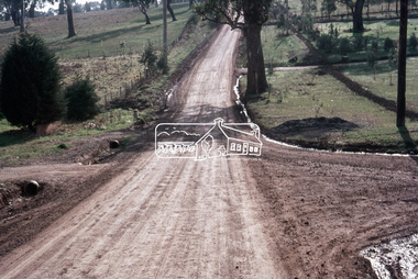 Slide, Looking north post drainage repairs on Bonds Road near Martin property and Montpelier Drive, Lower Plenty, c.July 1972, 1972