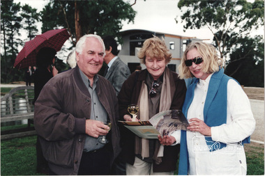 Photograph, Architect Graeme Gunn with unknown guests at the launch of the Kinloch Gardens development, 93 Arthur Street, Eltham, April 1998