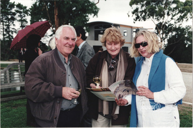 Photograph, Architect Graeme Gunn with unknown guests at the launch of the Kinloch Gardens development, 93 Arthur Street, Eltham, April 1998, April 1998