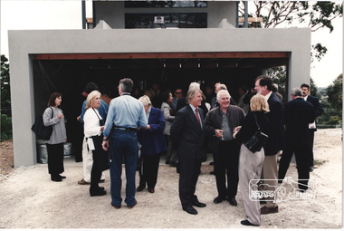 Photograph, Robert Marshall with Graeme Gunn chatting to John and Jenny Graves (front right) at the launch of the Kinloch Gardens development, 93 Arthur Street, Eltham, April 1998, April 1998