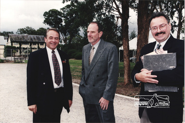 Photograph, Architect Ian Jelbart (centre) with Elders Real Estate agents at the launch of the Kinloch Gardens development, 93 Arthur Street, Eltham, April 1998