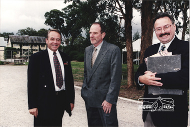 Photograph, Architect Ian Jelbart (centre) with Elders Real Estate agents at the launch of the Kinloch Gardens development, 93 Arthur Street, Eltham, April 1998, April 1998