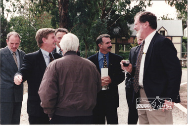 Photograph, L-R: Architect Ian Jelbart, Planning Minister Rob Maclellan, Elders agent (at rear), Architect Graeme Gunn (back to camera), Wayne Phillips, John Graves at the launch of the Kinloch Gardens development, 93 Arthur Street, Eltham, April 1998