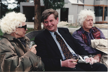 Photograph, Planning Minister Rob Maclellan with two unknown women at the launch of the Kinloch Gardens development, 93 Arthur Street, Eltham, April 1998
