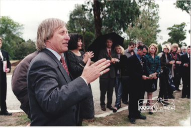 Photograph, Nillumbik Shire President Robert Marshall addressing the guests at the launch of the Kinloch Gardens development, 93 Arthur Street, Eltham, April 1998, April 1998