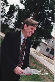 Photograph, Planning Minister Rob Maclellan addressing the guests at the launch of the Kinloch Gardens development, 93 Arthur Street, Eltham, April 1998, April 1998