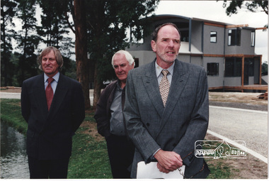 Photograph, Standing L-R: Nillumbik Shire President Robert Marshall, Architect Graeme Gunn and owner Architect Ian Jelbart addressing the guests at the launch of the Kinloch Gardens development, 93 Arthur Street, Eltham, April 1998, April 1998