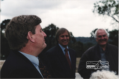 Photograph, Planning Minister Rob Maclellan with Nillumbik Shire President Robert Marshall and Architect Graeme Gunn at rear at the launch of the Kinloch Gardens development, 93 Arthur Street, Eltham, April 1998