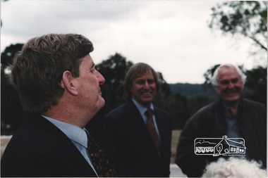 Photograph, Planning Minister Rob Maclellan with Nillumbik Shire President Robert Marshall and Architect Graeme Gunn at rear at the launch of the Kinloch Gardens development, 93 Arthur Street, Eltham, April 1998, April 1998