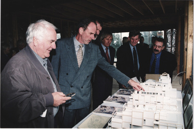 Photograph, L-R: Architects Graeme Gunn and Ian Jelbart look over the concept planning model with Nillumbik Shire Councillor, John Graves, Nillumbik Shire President Robert Marshall, Planning Minister Rob Maclellan and Wayne Phillips, MP at the launch of the Kinloch Gardens development, 93 Arthur Street, Eltham, April 1998, April 1998