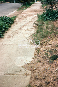 Photograph, Foothpath and kerb damage, Madine Way, Eltham, 3 Sep 1981