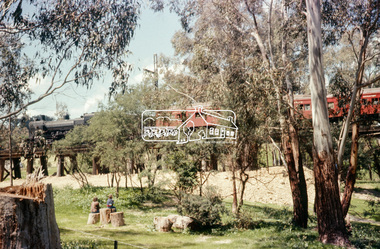 Slide - Photograph, Russell Yeoman, Steam engine K-184 hauling a special excursion train across the Eltham Railway Trestle Bridge, c.1974