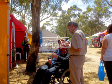 Photograph, Jim Connor, Eltham District Historical Society display, Eltham Festival, Alistair Knox Park, 9 Nov 2014