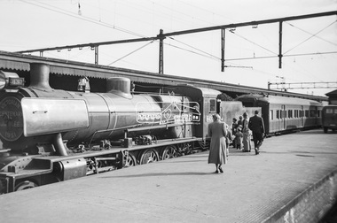 Photograph, George Coop, Steam locomotive N-430 and the Victorian Centenary Jubilee train at Spencer Street Railway Station, Feb. 1951