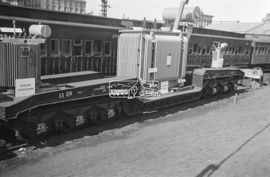 Photograph, George Coop, Power transformer on a QB boiler/flat wagon on display at Spencer Street Railway Station during the 1954 Victorian Railways Centenary Exhibition, Sep. 1954
