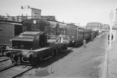 Photograph, George Coop, E-class electric locomotive E-1101  on display at Spencer Street Railway Station during the 1954 Victorian Railways Centenary Exhibition, Sep. 1954