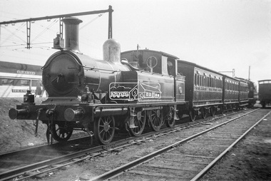 Photograph, George Coop, Steam locomotive E-class 2-4-2 on display at Spencer Street Railway Station during the 1954 Victorian Railways Centenary Exhibition, Sep. 1954