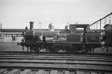 Photograph, George Coop, Steam locomotive E-class 2-4-2 on display at Spencer Street Railway Station during the 1954 Victorian Railways Centenary Exhibition, Sep. 1954