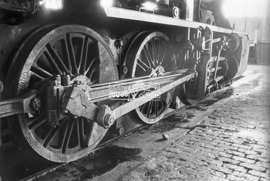 Photograph, George Coop, Valve gear, J-class steam locomotive, Ararat Locomotive Shed, c.1971