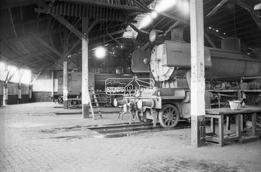 Photograph, George Coop, Steam locomotives K-174 and J-541 in the Ararat Locomotive Shed, c.1971